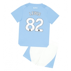 Strój piłkarski Manchester City Rico Lewis #82 Koszulka Podstawowej dziecięce 2023-24 Krótki Rękaw (+ Krótkie spodenki)