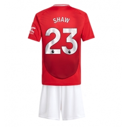 Strój piłkarski Manchester United Luke Shaw #23 Koszulka Podstawowej dziecięce 2024-25 Krótki Rękaw (+ Krótkie spodenki)